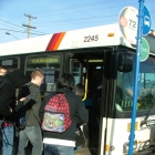 Students loading transit
